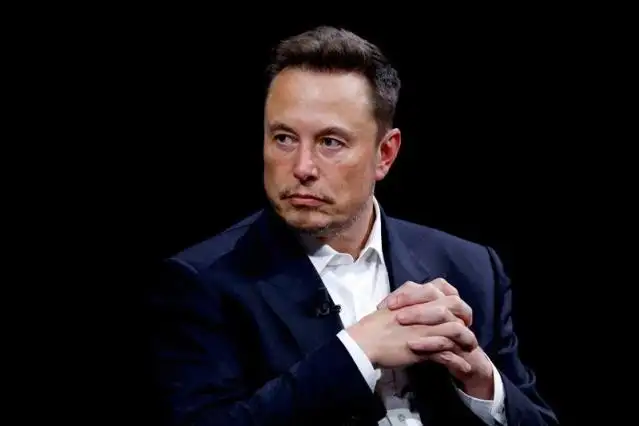 Elon Musk, Tesla, AI, robots, shares, voting power, control, leadership, ambitions, bid, grip